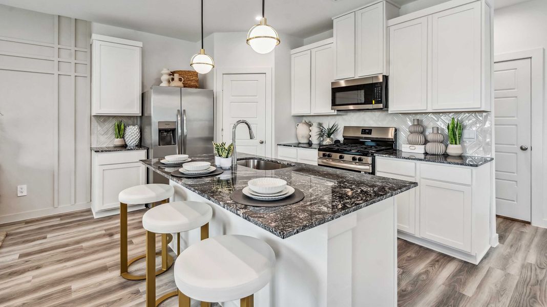Furnished interior in a model home at Grand West in Houston (Image 10).