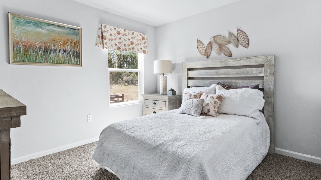 Furnished interior in a model home at Wesley Park in Crawfordville (Image 10).