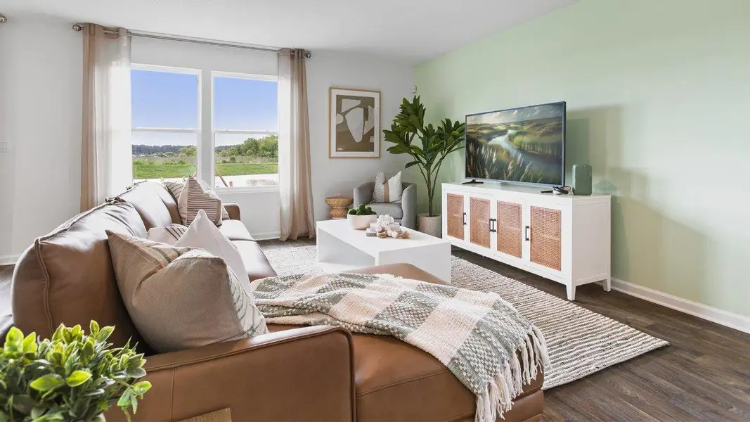 Furnished interior in a model home at Canopy Oaks in Kingsland (Image 7).