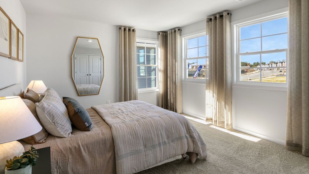 Furnished interior in a model home at The Meadows at Kinsley in Jamestown (Image 15).