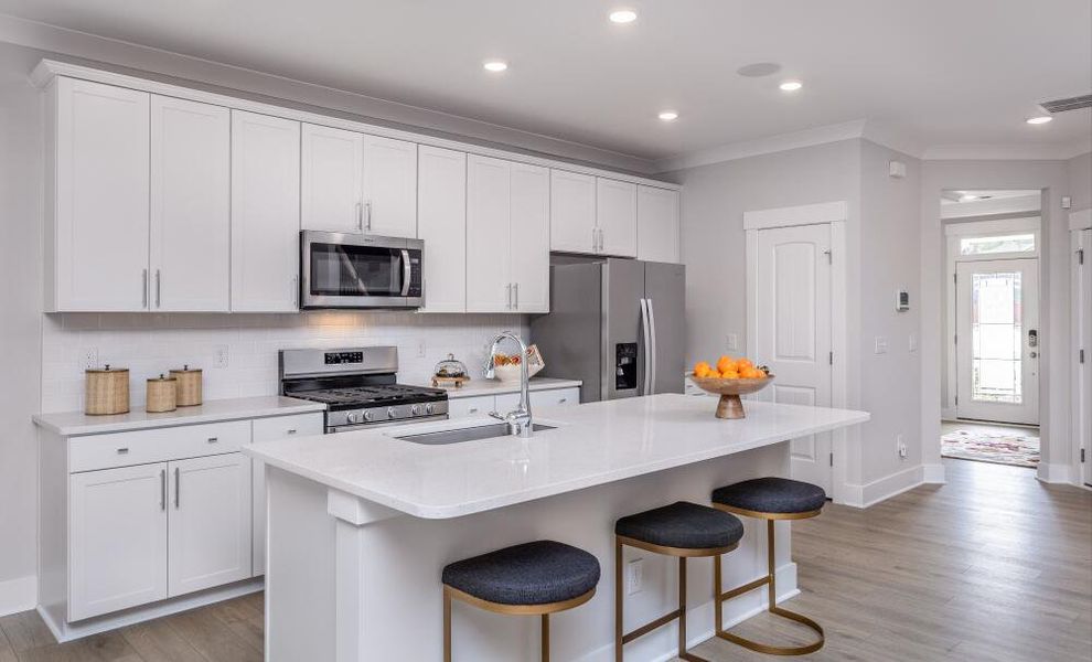 Furnished interior in a model home at Running Brook Townes in Durham (Image 17).