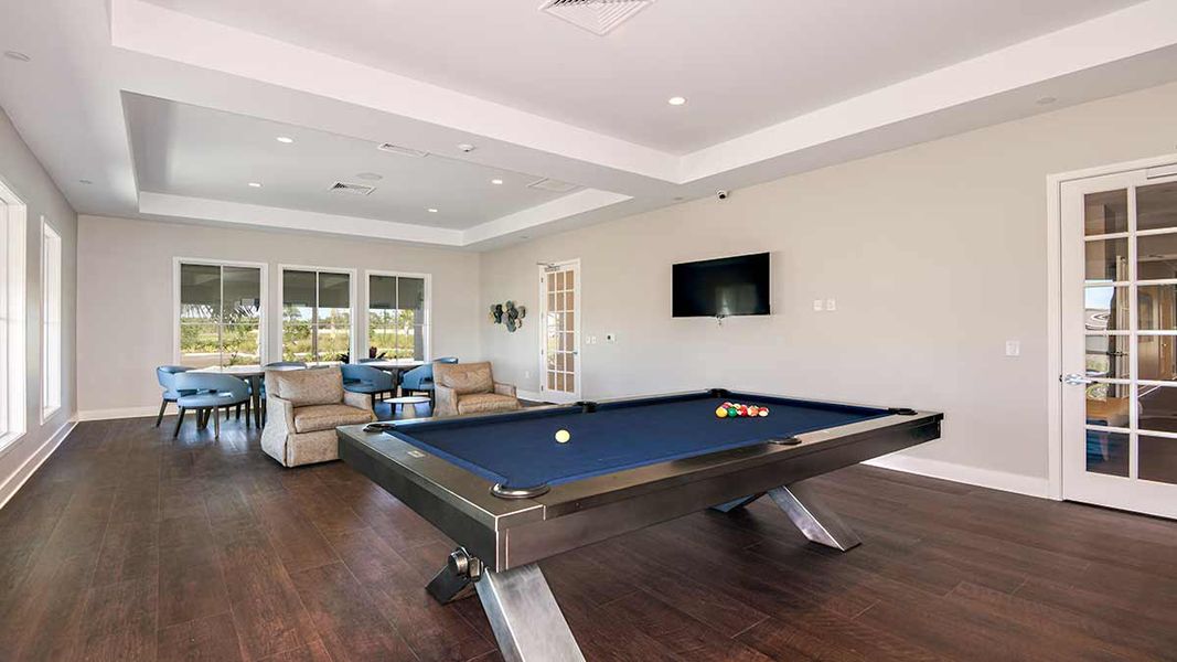 Furnished interior in a model home at The Cove at West Port in Port Charlotte (Image 6). Furnished interior in a model home at The Cove at West Port in Port Charlotte (Image 6).