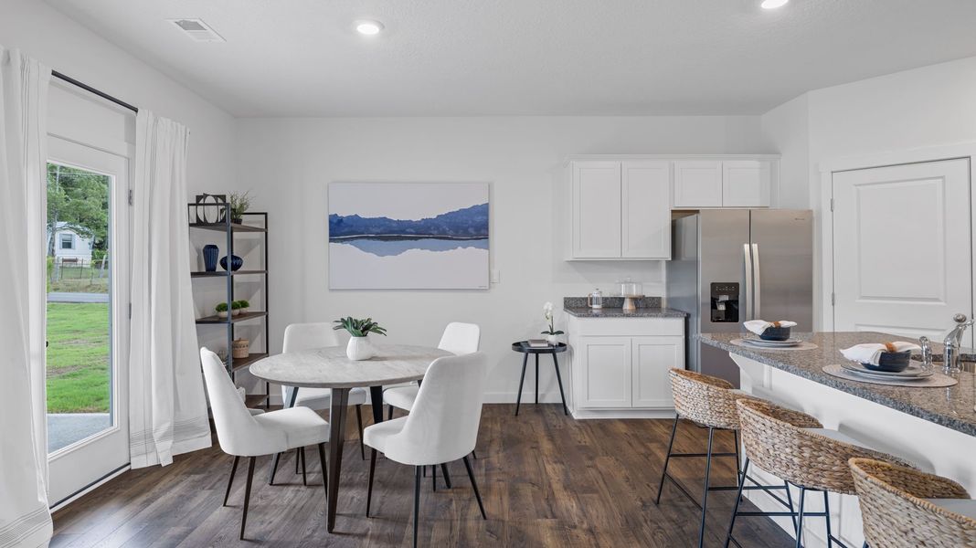 Furnished interior in a model home at Hillcrest Landing in McDonald (Image 14).