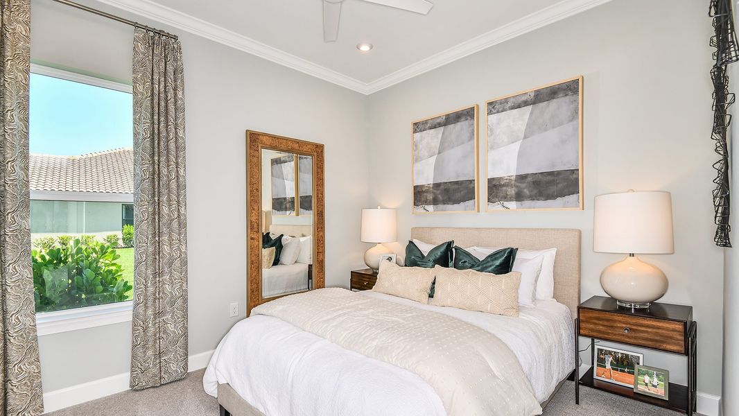 Furnished interior in a model home at Esplanade by the Islands in Naples (Image 41).