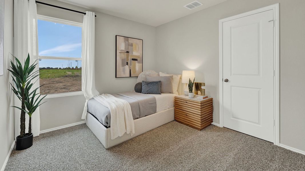 Furnished interior in a model home at Lantana in Lockhart (Image 18).