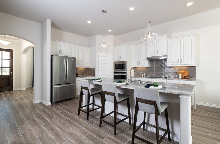 Kitchen | Concept 2267 at Coyote Crossing in Godley, TX by Landsea Homes