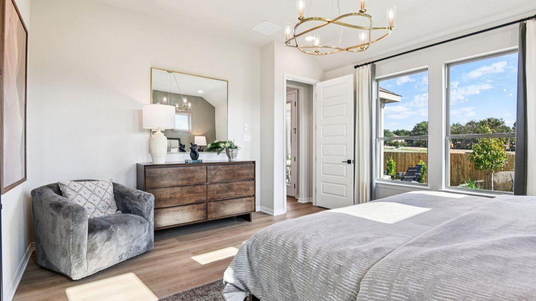 Furnished interior in a model home at Clear Creek in New Braunfels (Image 41).