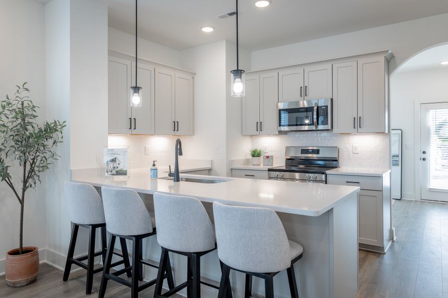 Furnished interior in a model home at The Parks of Mill Town in Chattanooga (Image 10).