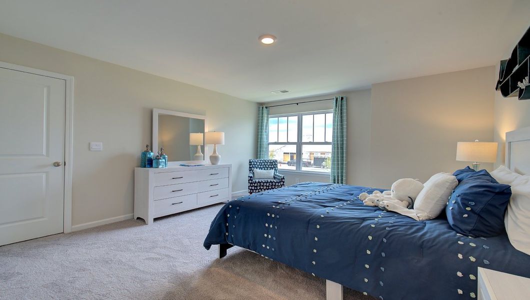 Furnished interior in a model home at Tap Root Farms in Fletcher (Image 23).