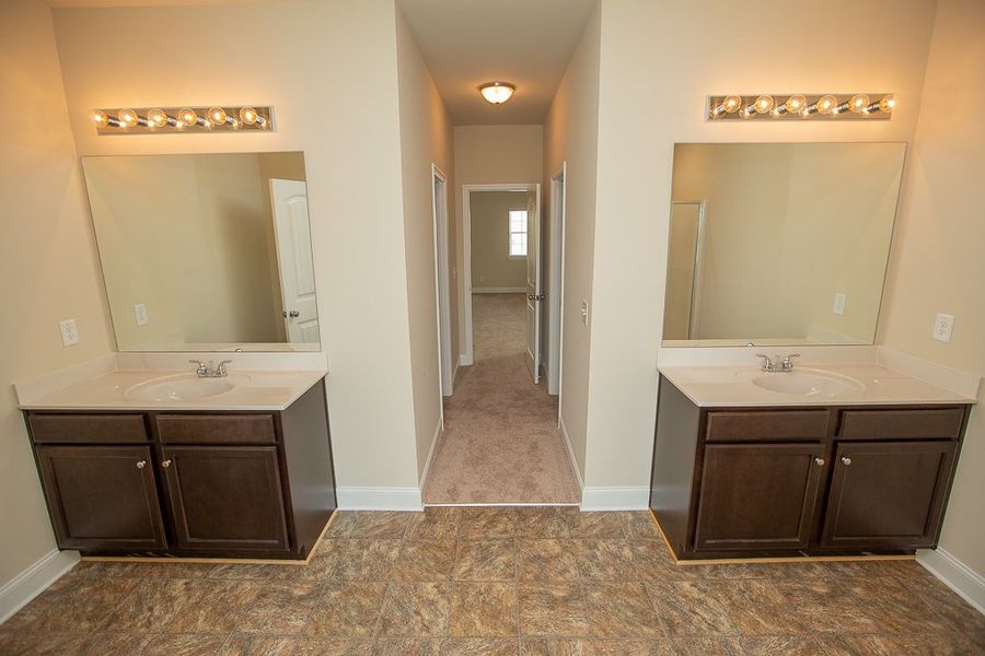 Furnished interior in a model home at Creekside at Scarborough in College Park (Image 6).