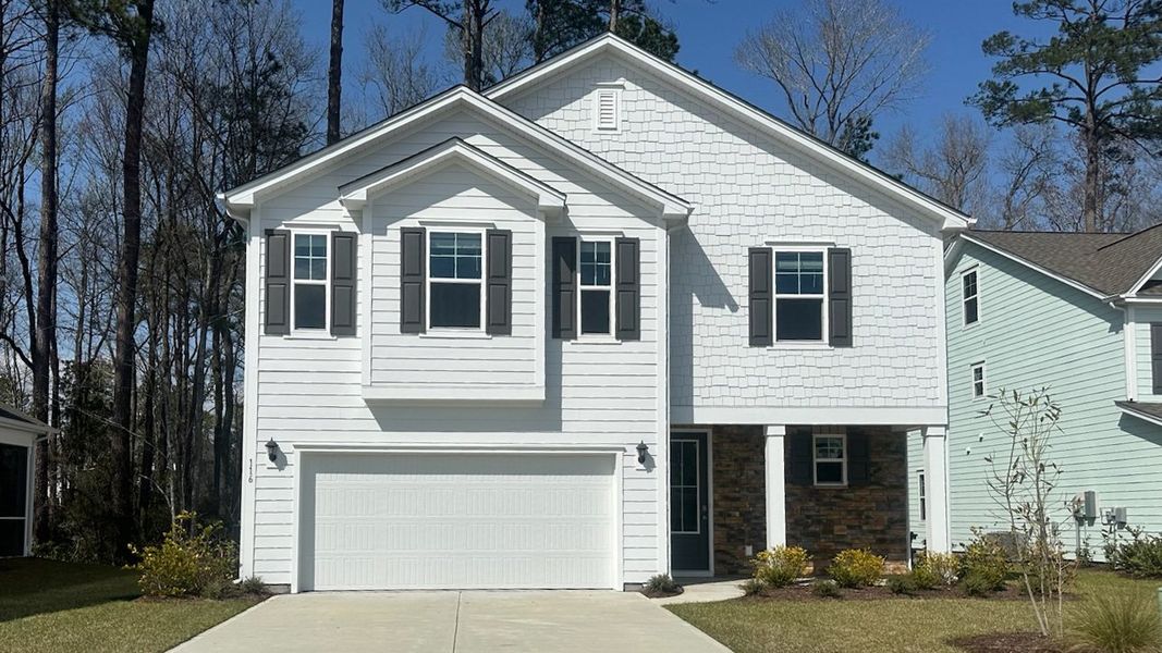 Front exterior of a home in the The Preserve at Shaftesbury Glen community, located in Conway, SC (Image 11).