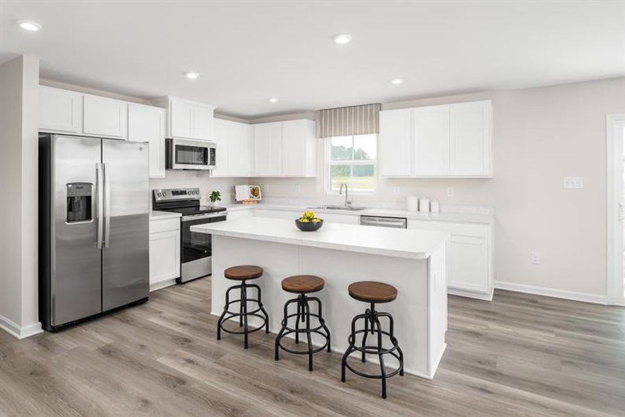 Bright, open kitchens with space for projects, family dinners, and gatherings.