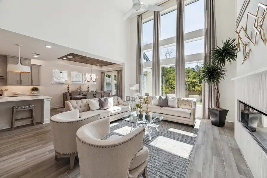 Furnished interior in a model home at The Woodlands Hills – 55' in Willis (Image 4).