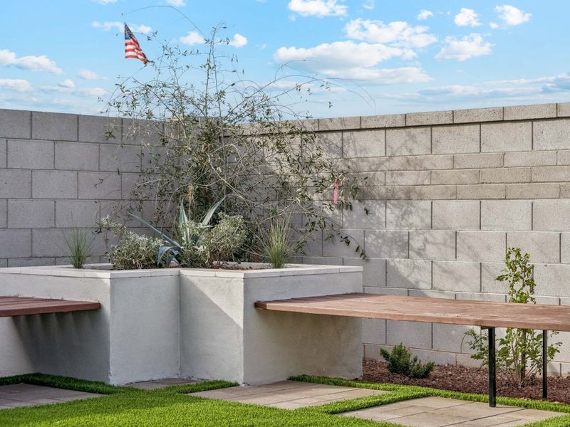 A stone wall with a flag.