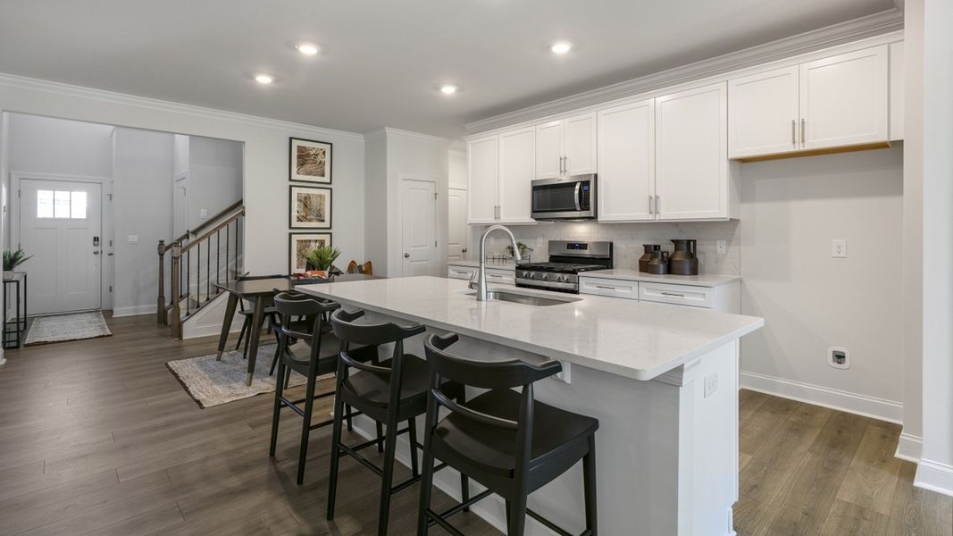 Furnished interior in a model home at The Meadows at Kinsley in Jamestown (Image 4).