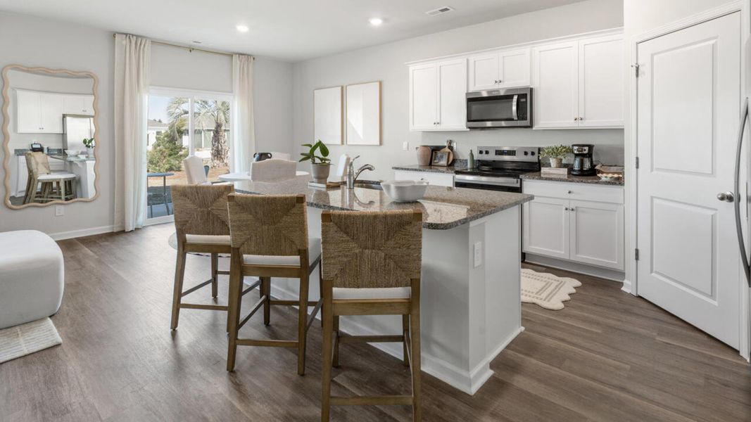 Furnished interior in a model home at Bella Point in Bolivia (Image 5). Furnished interior in a model home at Bella Point in Bolivia (Image 5).