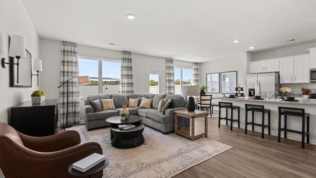 Furnished interior in a model home at Rushing Waters Townhomes in North Augusta (Image 3).