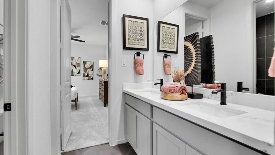 Furnished interior in a model home at Canterra Creek  60' in Iowa Colony (Image 24).