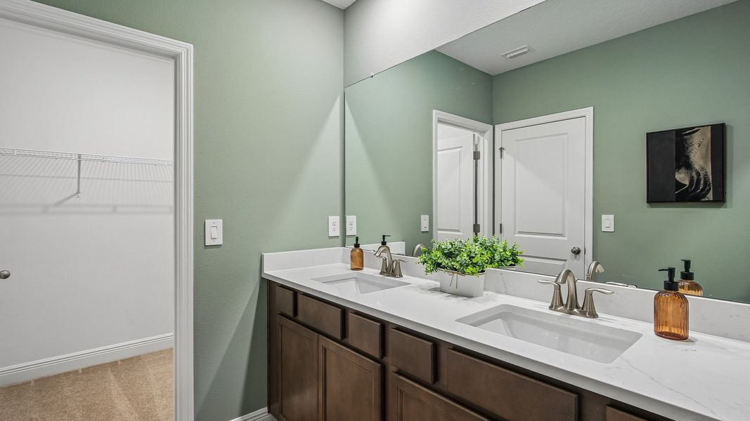 Furnished interior in a model home at Sanctuary at Citrus Park Townhomes in Tampa (Image 20).