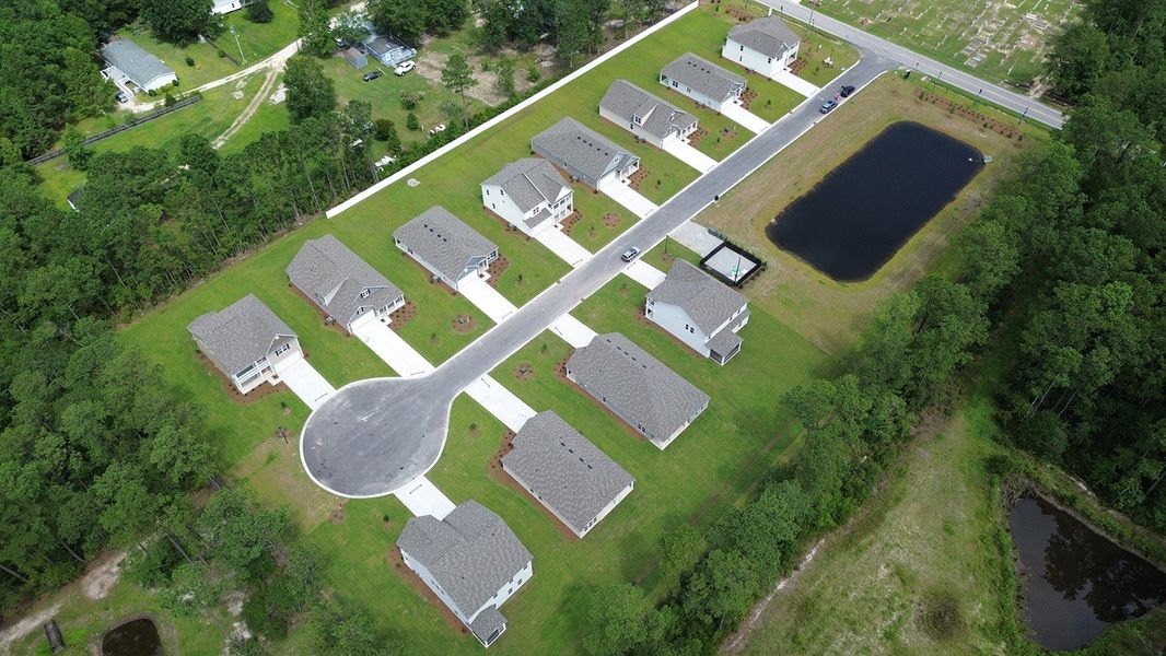 Aerial view of the Spring View Landing community in Loris, SC, showing layout and nearby surroundings (Image 1).