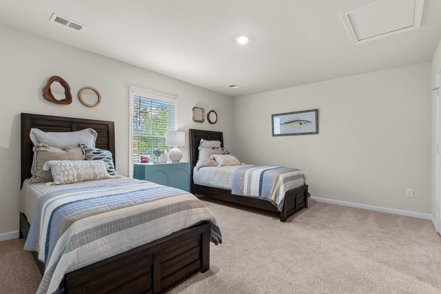 Furnished interior in a model home at Harmon Terrace in Hopkins (Image 16).