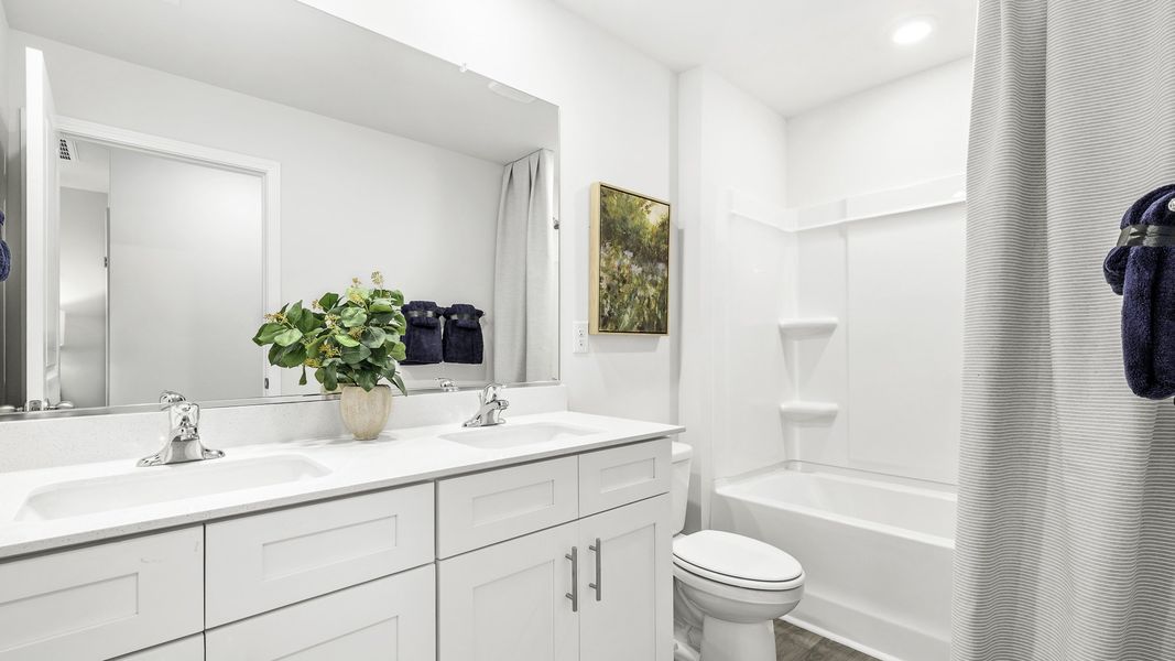 Furnished interior in a model home at Willow Mill in Thomasville (Image 19).