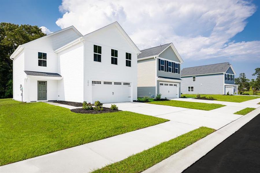 Front exterior of a home in the Harpers Glen Single Family community, located in Wendell, NC (Image 4).