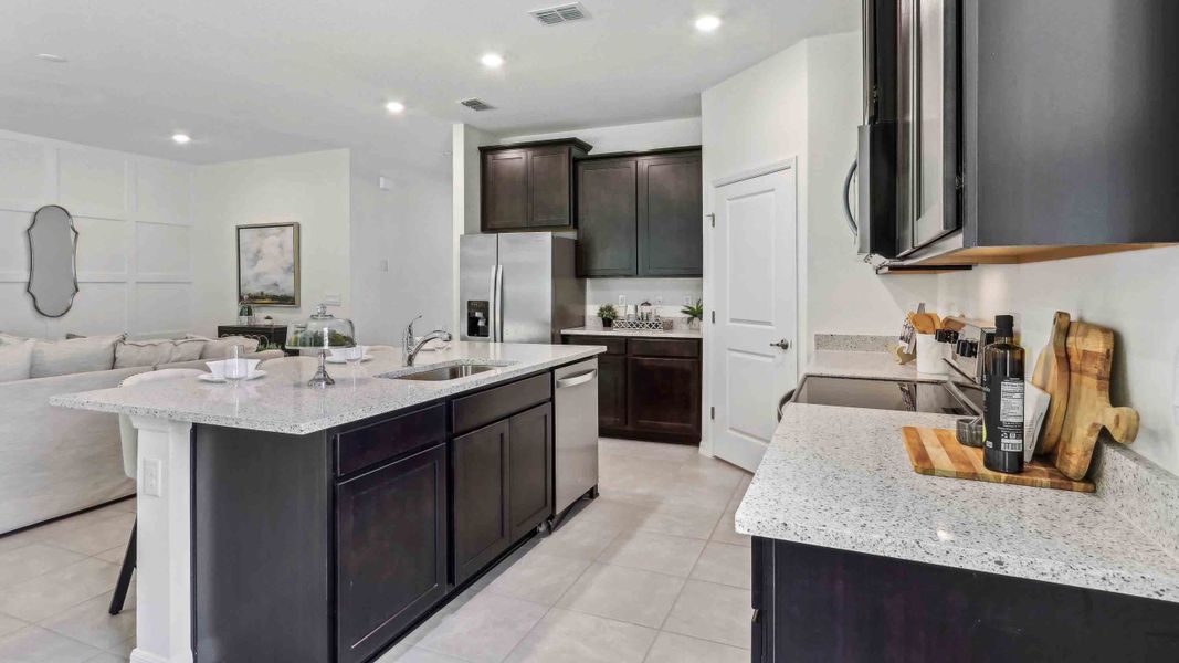 Furnished interior in a model home at Mockingbird Reserve at Winding Oaks in Ocala (Image 6).