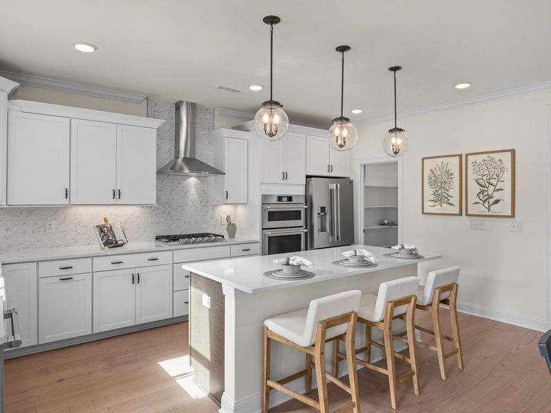 Furnished interior in a model home at Addison West in Holly Springs (Image 3).