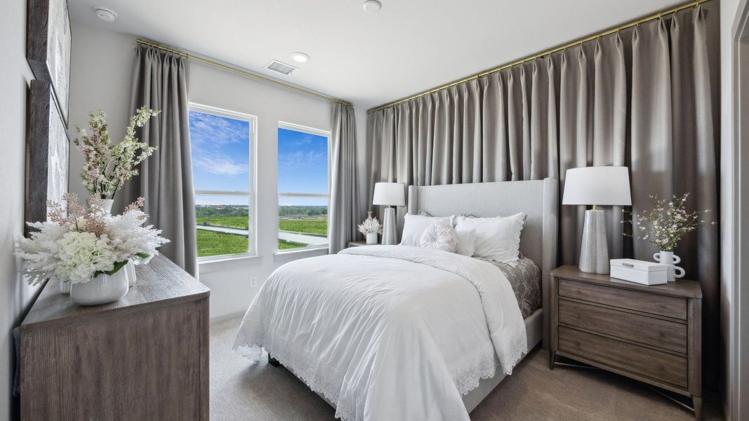 Furnished interior in a model home at Painted Tree - Woodland West in McKinney (Image 40).