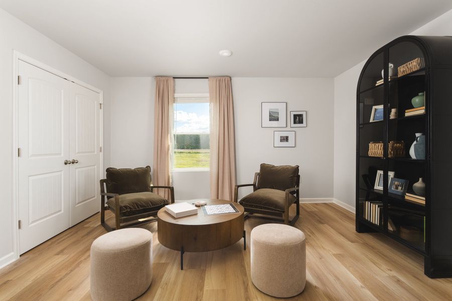 Furnished interior in a model home at The Bluffs At Carey Station in Greensboro (Image 16).