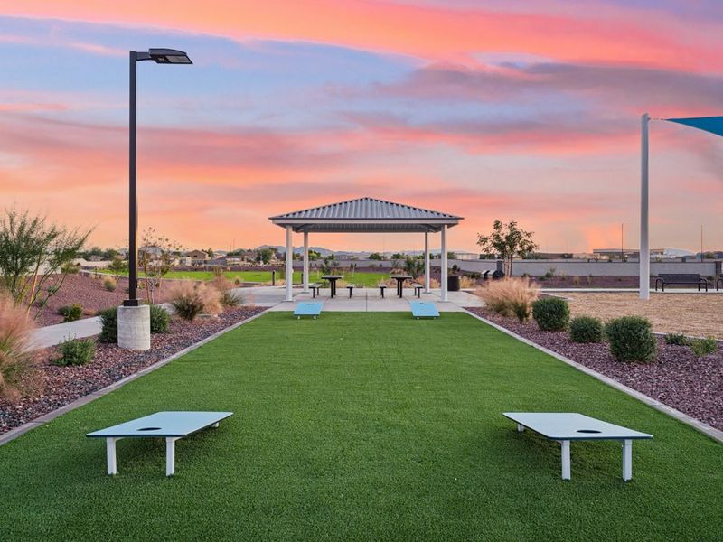 A park with benches and a gazebo.