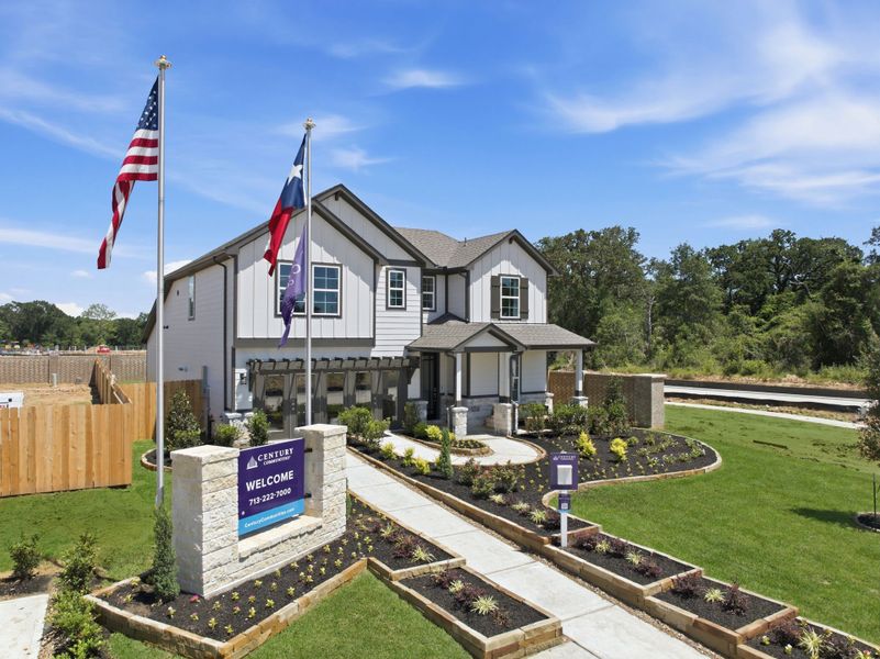 A house with flags in the front. A house with flags in the front.