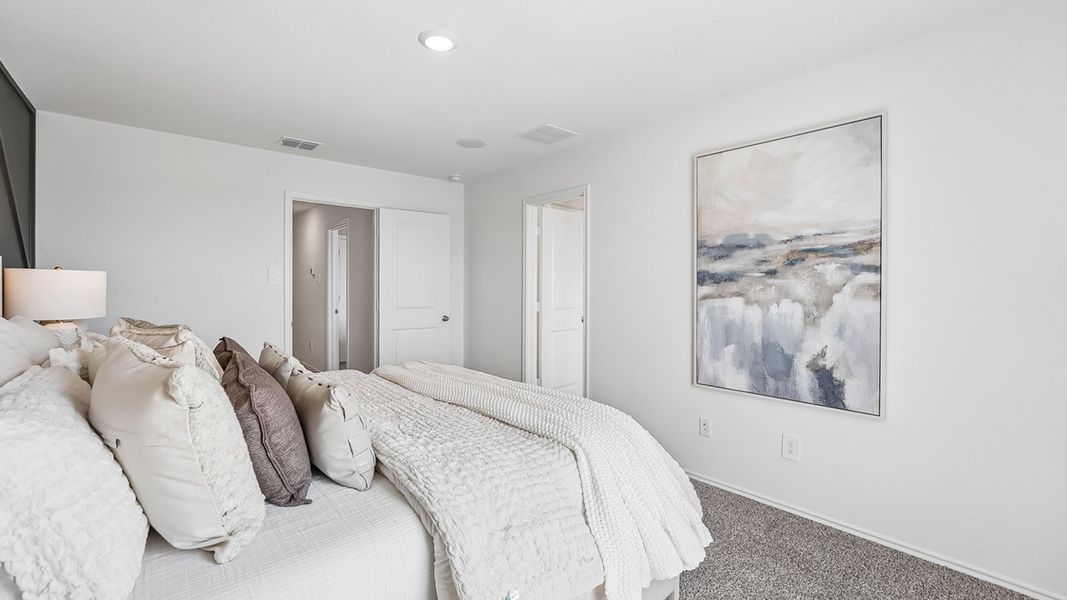 Furnished interior in a model home at Marigold in Kyle (Image 21).