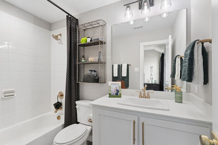 Furnished interior in a model home at Sweetgrass 65s in Haslet (Image 42).