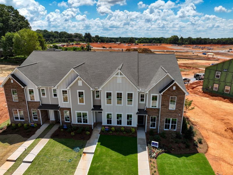 Front exterior of a home in the The Townes at Cadia Village community, located in Matthews, NC (Image 3). Front exterior of a home in the The Townes at Cadia Village community, located in Matthews, NC (Image 3).
