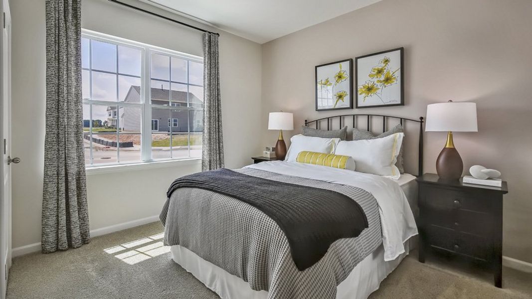 Furnished interior in a model home at The Landing at Winston Pointe in Clayton (Image 15). Furnished interior in a model home at The Landing at Winston Pointe in Clayton (Image 15).