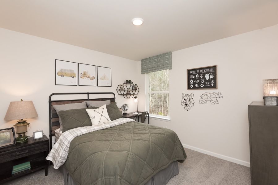 The Dakota floorplan features three secondary bedrooms.