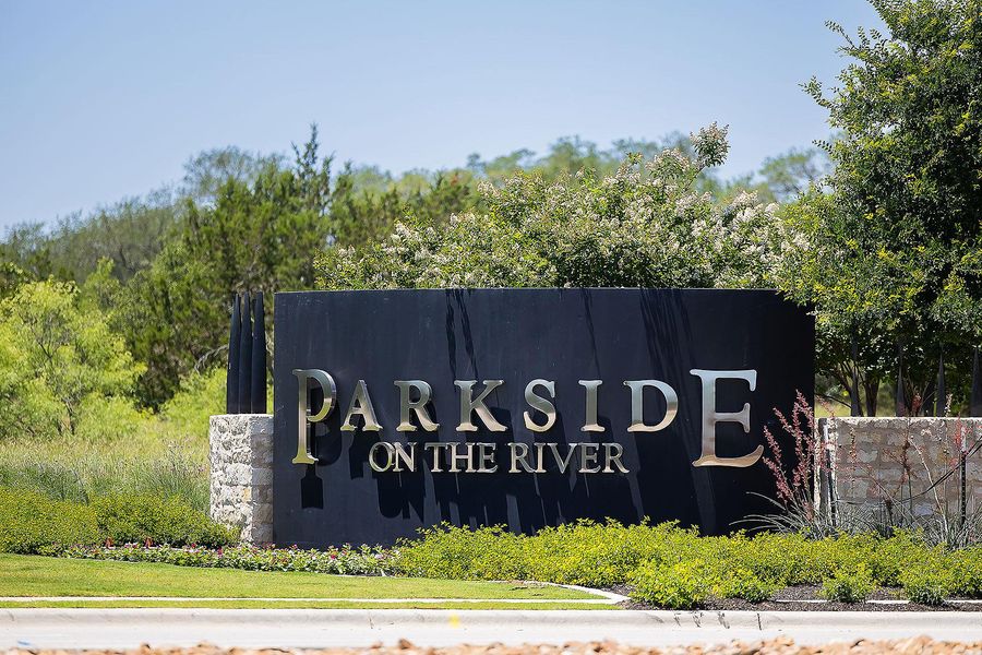 Entrance to the Parkside On The River community in Georgetown, TX, featuring signage and landscaping (Image 8).
