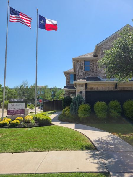 A charming brick home with lush landscaping in Villas of Middleton by Megatel Homes (Plano, TX). A charming brick home with lush landscaping in Villas of Middleton by Megatel Homes (Plano, TX).