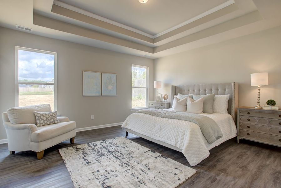 Furnished interior in a model home at Legends at Old Monroe in Monroe (Image 8).