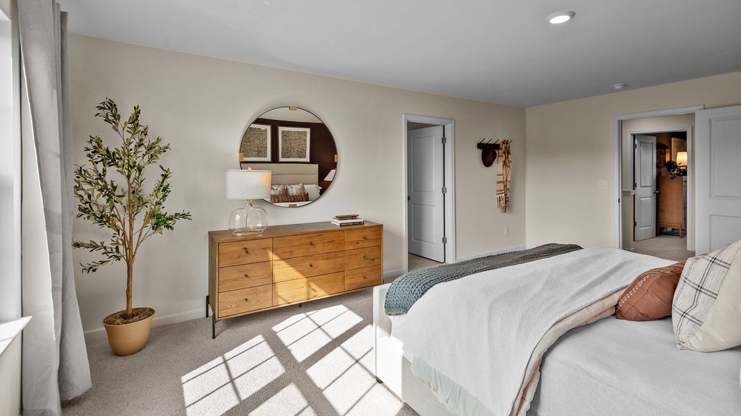 Furnished interior in a model home at The Preserve at Kinsley in Jamestown (Image 16).