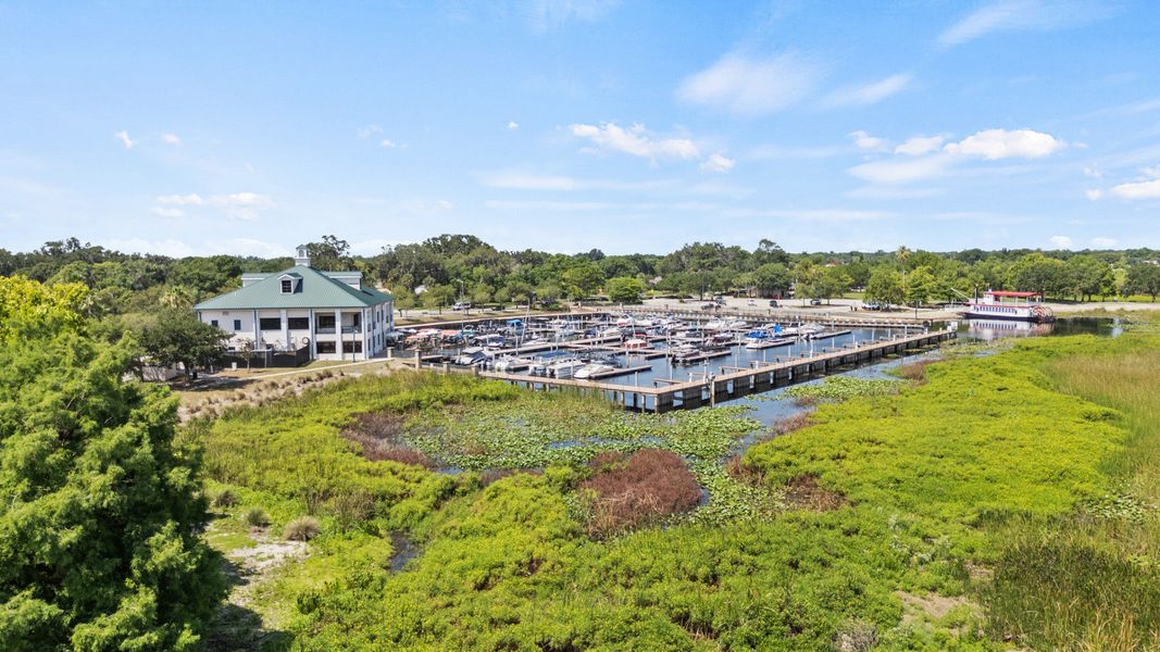 Aerial view of St. Cloud Marina with boat docks and scenic Lake Tohopekaliga shoreline near Cyrene at Harmony. Aerial view of St. Cloud Marina with boat docks and scenic Lake Tohopekaliga shoreline near Cyrene at Harmony.