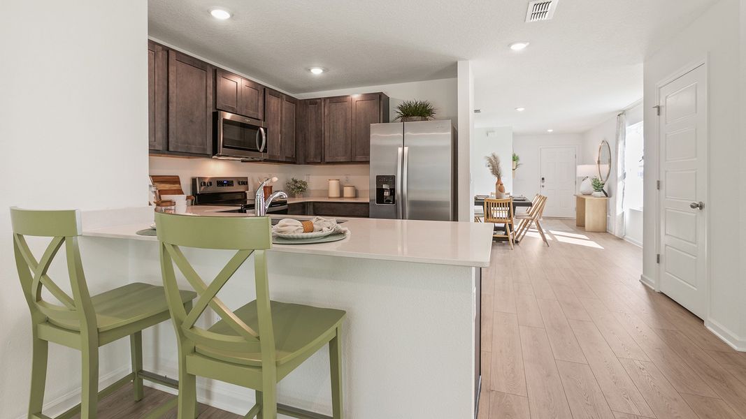 Furnished interior in a model home at Copes Landing in Jacksonville (Image 51).