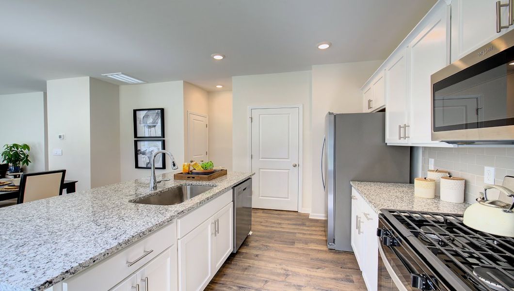 Furnished interior in a model home at Heritage Park in Fletcher (Image 11).