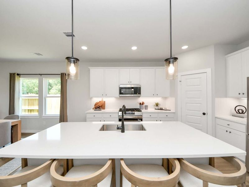 Furnished interior in a model home at Enclave at Newport in Crosby (Image 23).