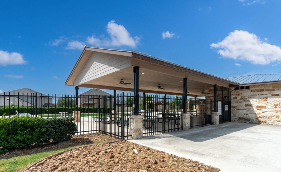 Front exterior of a home in the The Meadows at Hunters Ranch community, located in San Antonio, TX (Image 11). Front exterior of a home in the The Meadows at Hunters Ranch community, located in San Antonio, TX (Image 11).
