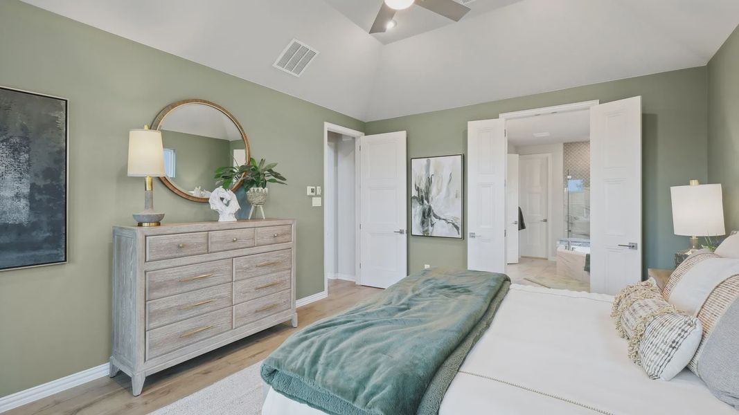 Indulge in premium comfort at Wildflower Ranch. Vaulted ceilings and luxe decor enhance this serene bedroom retreat. Indulge in premium comfort at Wildflower Ranch. Vaulted ceilings and luxe decor enhance this serene bedroom retreat.