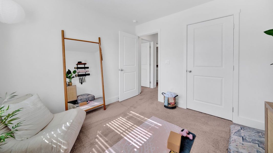 Furnished interior in a model home at Spring Lake Farms Townhomes in Knoxville (Image 26).