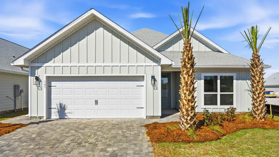 Front exterior of a home in the WindMark Beach Emerald Series community, located in Port Saint Joe, FL (Image 13). Front exterior of a home in the WindMark Beach Emerald Series community, located in Port Saint Joe, FL (Image 13).